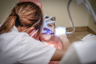 Dentist working on a child