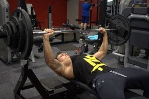Build Muscle Man bench pressing