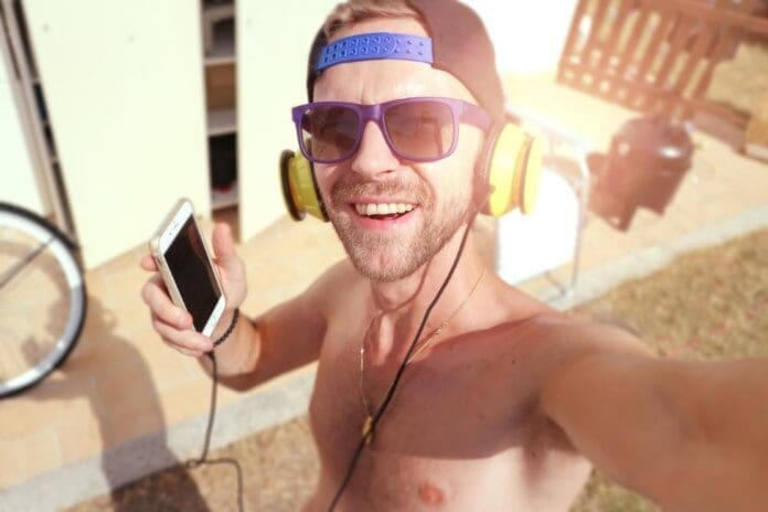 Man working out while listening to music on headphones